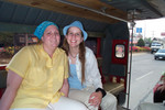 Kim and Angela riding a songtaew (a type of taxi)